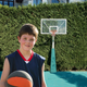 Illustration for article titled No Excuse: This Kid Who’s Rich Enough To Have A Full-Blown Basketball Court In His Backyard Is By Far The Shittiest Basketball Player On His Team em/em
